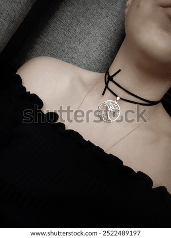 Big silver tree of life pendant choker necklace on black cord at woman's neck, jewelry, jewellery model, anonymous, woman without face, outfit details, accessory, talisman, amulet, Slavic mythology