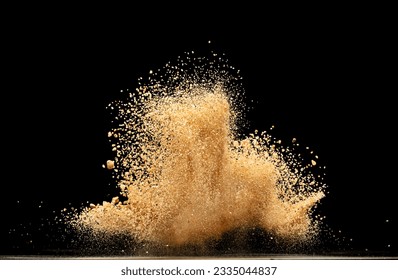 Big size Sand flying explosion, Golden grain wave explode. Abstract cloud fly. Yellow colored sand splash throwing in Air. Black background Isolated selective focus blur - Powered by Shutterstock