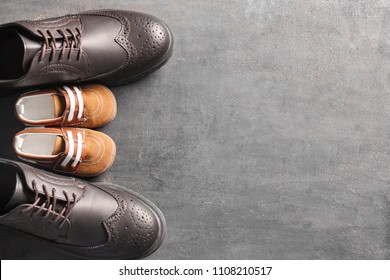 Big And Small Shoes On Grey Background. Father's Day Celebration