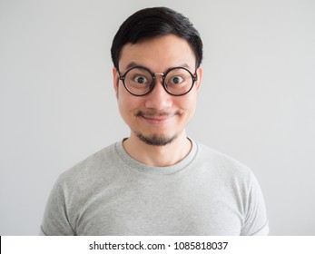 Big Smile Face Of Very Happy Asian Man With Eyeglasses.