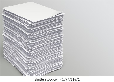 A Big Stack Of Blank Paper On The Desk