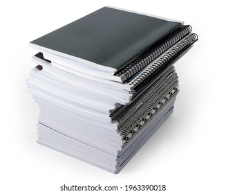Big stack of the different thick school exercise books with ordinary and spiral bindings on a white background