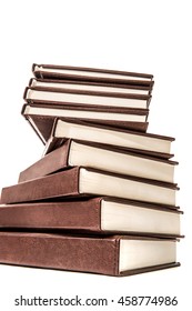 Big stack of old antique books isolated on white background