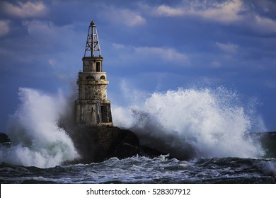Big storm near an old lighthouse in Achtopol bay, Black sea, Bulgaria