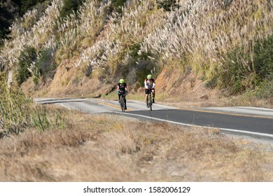 Big Sur, The Pacific Coast Highway/USA - October 16, 2019: Bicyclists Biking Along Highway 1 In Southern California.