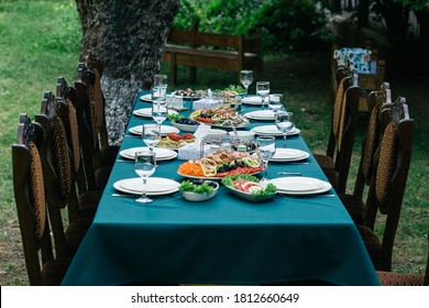 A Big Table Full Of Tasty Meals, Family Dinner Time