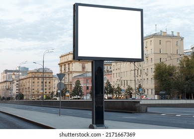 Big Tall Billboard In The City Center In The Morning, No Cars On The Road. Mock-up.