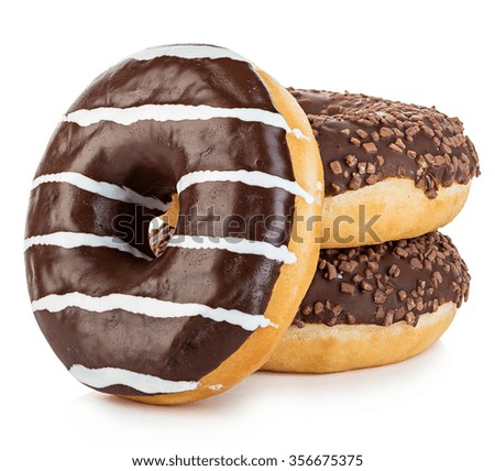 Big tasty appetizing donuts isolated close-up on a white background.