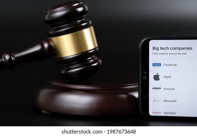 Big Tech Tax Regulation Concept. Smartphone With The List Of Companies (Google Definition Of Big Tech) Placed Next To The Judge Gavel. Stafford, United Kingdom, July 7, 2021.