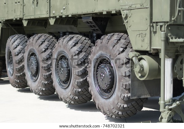 Big Tires of a big\
military truck.