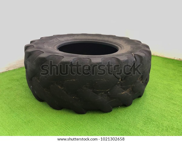 big torn tire at\
gym