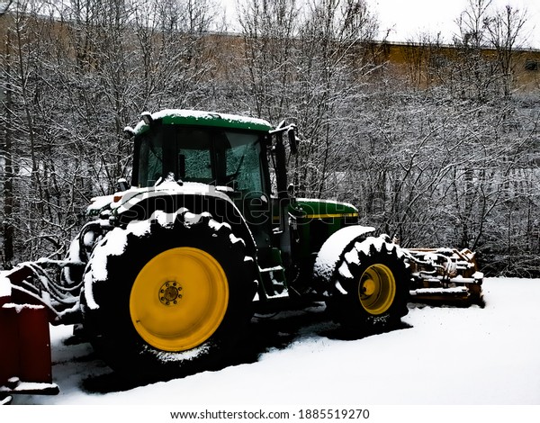 big tractor on white snow\
- Lysaker