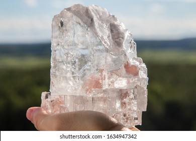 Big Transparent Salt Crystal In Hand