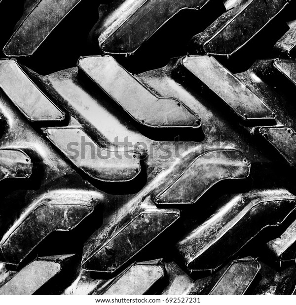 Big truck mud tires, close\
up.