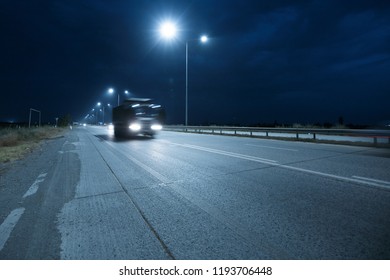 Big Truck On Countryside Road At Night. 