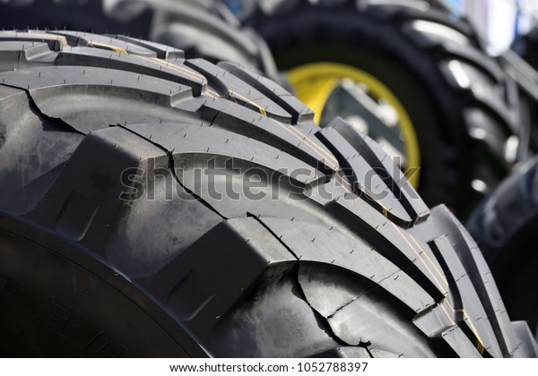Big truck wheel a black\
tires closeup