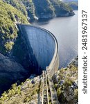 Big water hydroelectric dam on the river. Gordon Dam built over the Gordon river. Southwest National Park, Tasmania, Australia 