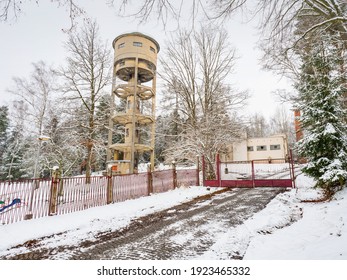 Big Water Tower In Cold Winter Weather. Potable Water Treatment Plant Above Town.