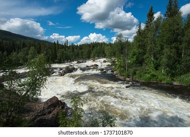 Big waterflow on the Olanga river on the boarder of Finland and Russia names Kivakkokoski. Biggest waterfall in Karelia situated in Paanajarvi National Park. Unique preserve nature