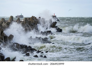 Big Waves Breaking On Breakwater During Autumn Storm In Baltic Sea