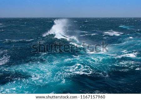 Big waves at open sea. Summer monsoon in Indian Ocean