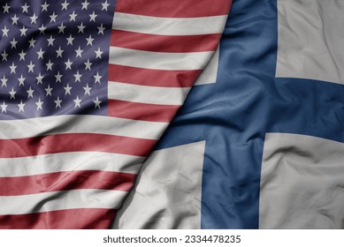 big waving colorful flag of united states of america and national flag of finland . macro