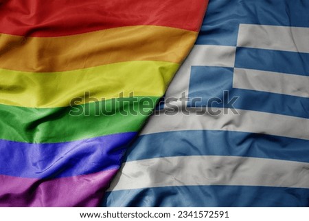 big waving realistic national colorful flag of greece and rainbow gay pride flag . macro