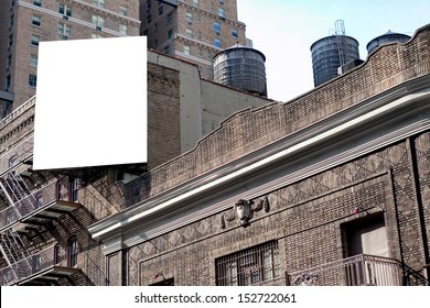 Big, White, Blank, Billboard On The Grey Brick Building.