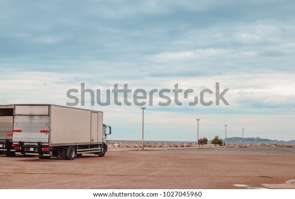 A Big White delivery\
truck with empty space place where you can put your text or ad -\
poster ready 