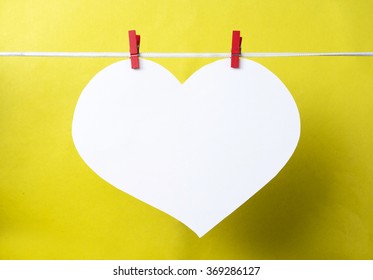  Big White Heart Hanging On The Clothesline. Space For Info Text. On  Color Background. Romantic Date, Invitation Card, Love Valentines Day Concept. Toned Image