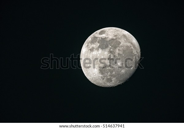 Big white Moon on dark\
night with copy space : shot at 1,260 mm. focal length. No crop\
image Detailed.