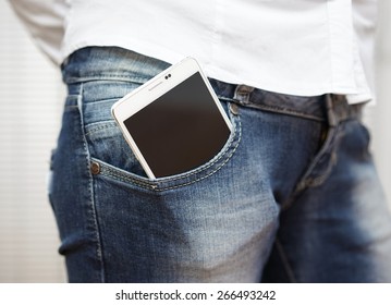 Big White Smart Mobile Phone In Jeans Pocket