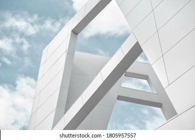 Big white walls of the building against the blue sky and white clouds. Modern architecture. Minimalistic design - Shutterstock ID 1805957557