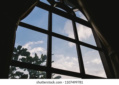 Big window frame and sky.