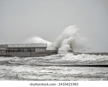 Big winter stormy waves of Baltic Sea hitting the pier, Kolobrzeg, Poland - Powered by Shutterstock