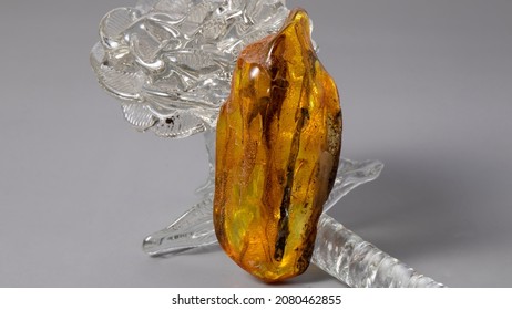 A Big Yellow Baltic Amber Stone. Isolated Natural Crystal.