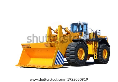 Big yellow front-end loader or all-wheel bulldozer isolated on white background. Heavy equipment machine and manufacturing equipment for open-pit mining