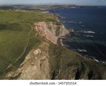 Bigbury on Sea, Devon, near Cornwall, England. Jurassic coast seaside landscape. Aerial drone view flying over ocean and beach