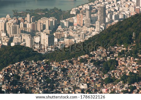 Biggest Brazilian Favela Rocinha on the Hill and Leblon Neighborhood Behind, Contrast Between Rich and Poor, in Rio de Janeiro, Brazil