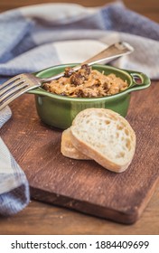 Bigos - Cabbage Stewed With Meat, Dried Mushrooms And Sausage On Old Wooden Background.Traditional Dish Of Polish Cuisine.