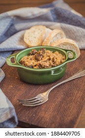 Bigos - Cabbage Stewed With Meat, Dried Mushrooms And Sausage On Old Wooden Background.Traditional Dish Of Polish Cuisine.