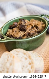 Bigos - Cabbage Stewed With Meat, Dried Mushrooms And Sausage On Old Wooden Background.Traditional Dish Of Polish Cuisine.