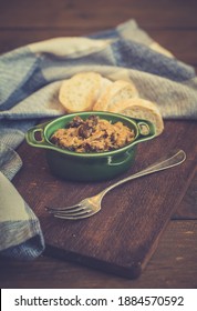 Bigos - Cabbage Stewed With Meat, Dried Mushrooms And Sausage On Old Wooden Background.Traditional Dish Of Polish Cuisine.