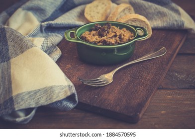 Bigos - Cabbage Stewed With Meat, Dried Mushrooms And Sausage On Old Wooden Background.Traditional Dish Of Polish Cuisine.