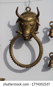 Bikaner, Rajasthan / India, December 19,2019: Various types of Indian God and other artifacts made of brass placed on curses for sale in Bikaner