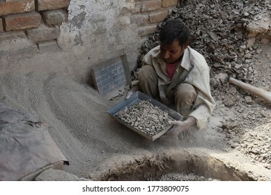 Bikaner, Rajasthan / India - June 06,2020: Potter Preparing Soil To Make Clay Pot  In Bikaner