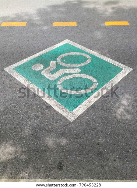 bikcycle lane sign on the\
road