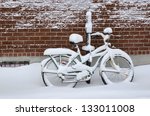 Bike covered with fresh snow in Montreal