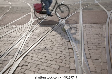 Bike and Cyclist on Tram Tracks, Rotterdam, Holland; Europe - Powered by Shutterstock