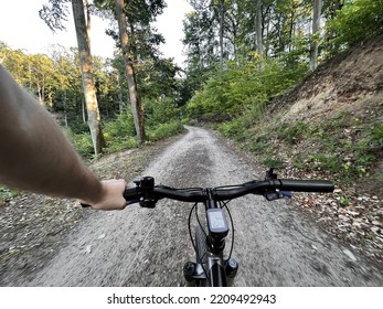 Bike Handlebar First Person View. Concept Of Outdoor Riding Mountain Bike.